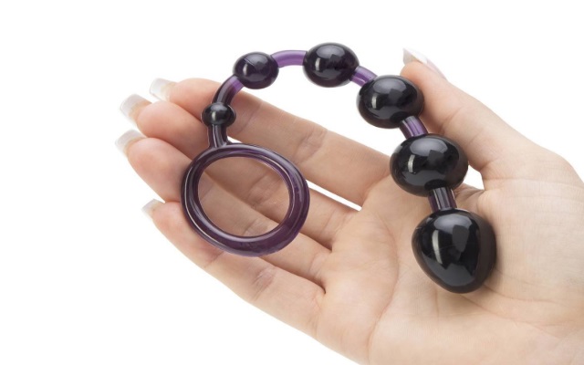 Dark anal beads that decrease in size