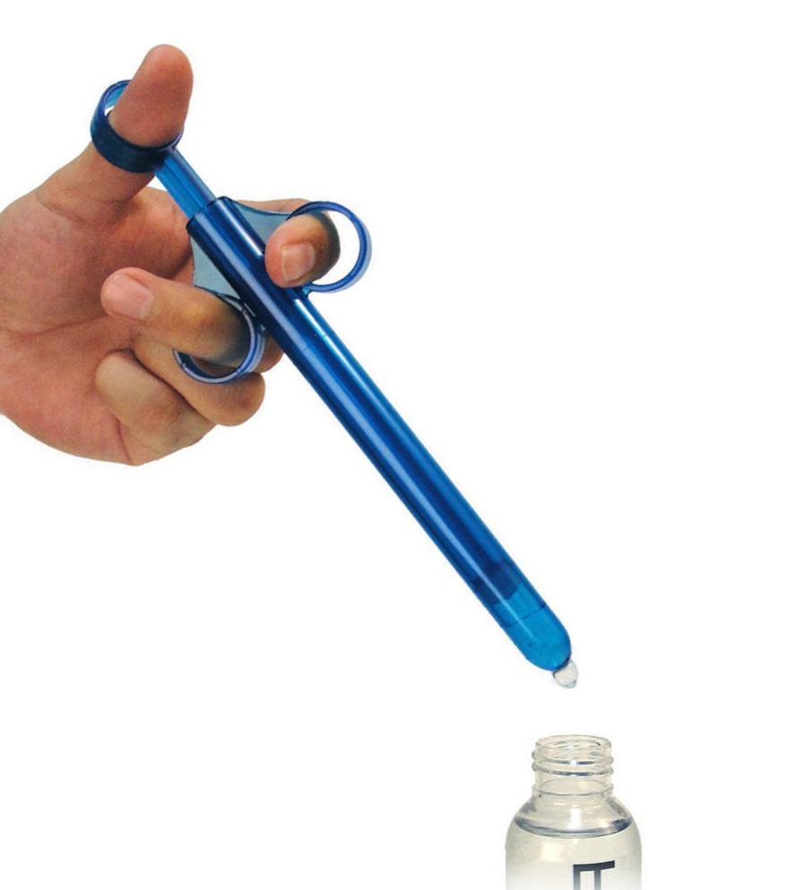 Close of up blue sex lube applicator extracting sex lube from bottle