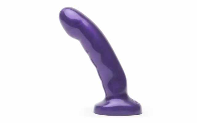 generic purple dildo over white background