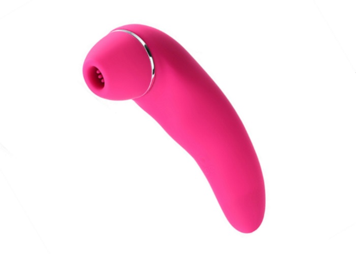 Pink clitoral (oral sex) vibrator with white background