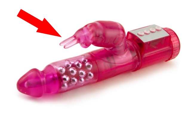 Pink rabbit vibrator with red arrow pointing to the elevated rabbit ears