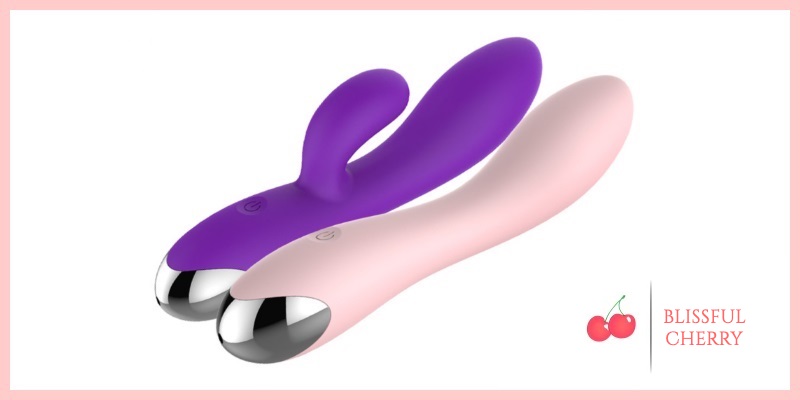 Purple rabbit vibrator alongside a light pink g-spot vibrator
